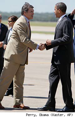 Rick Perry Greets Barrack Obama in Austin